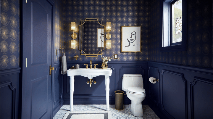 Bathroom with navy walls and gold accents