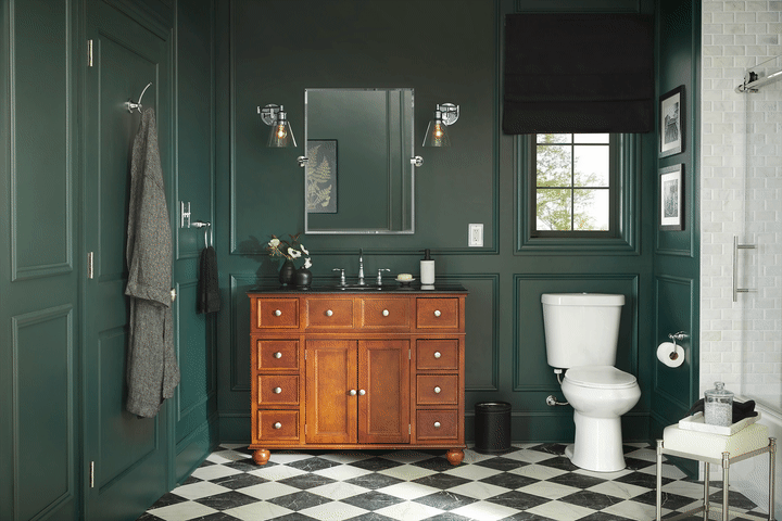 Bathroom with green walls and a checkered floor