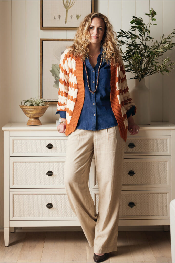 Woman wearing a plaid shirt and pants