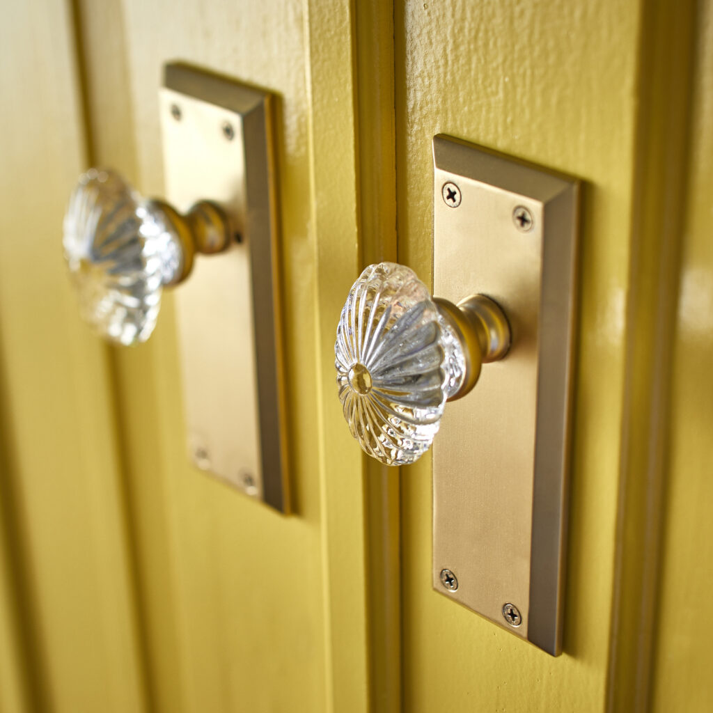 Glass doorknobs on a door