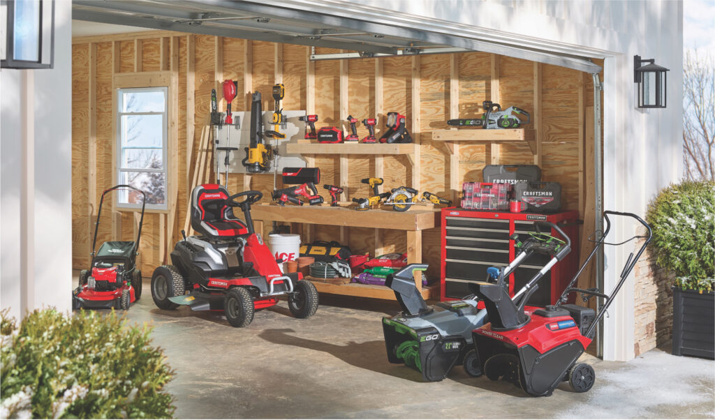 Garden shed with lawn equipment and tools