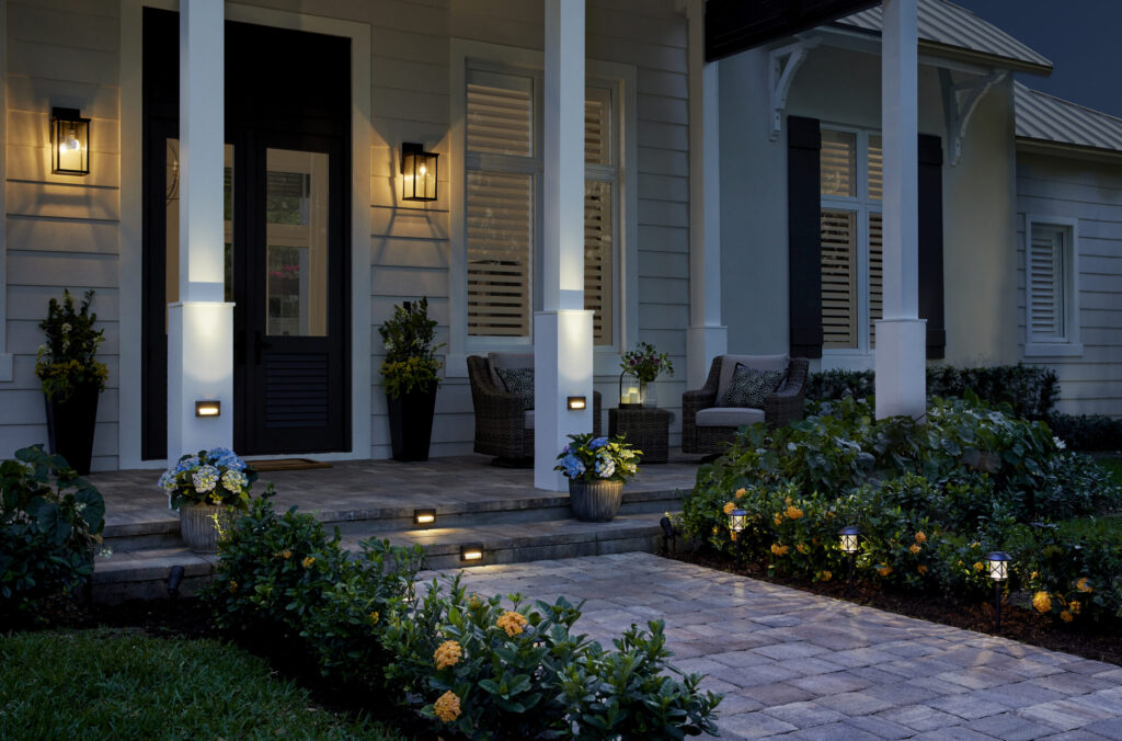 House exterior at night with porch lighting