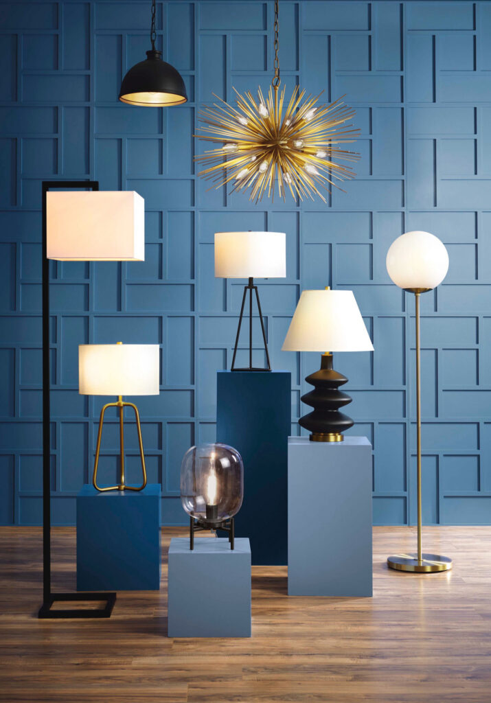 Display of lamps against a blue wall