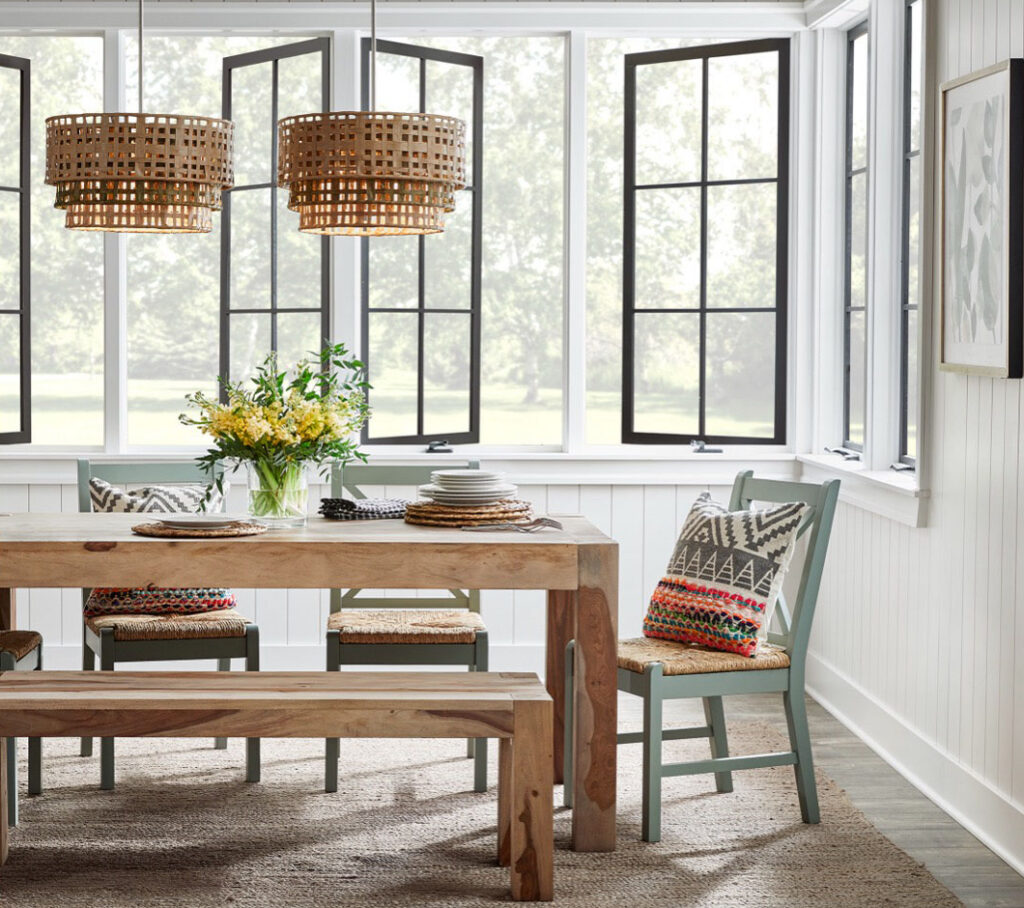 Dining room with a wood table and pendant lights
