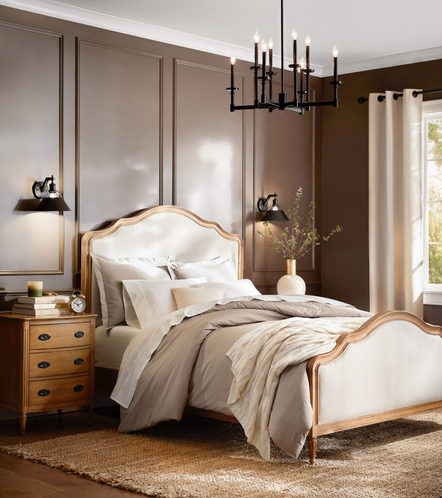 Bedroom with a chandelier and neutral bedding