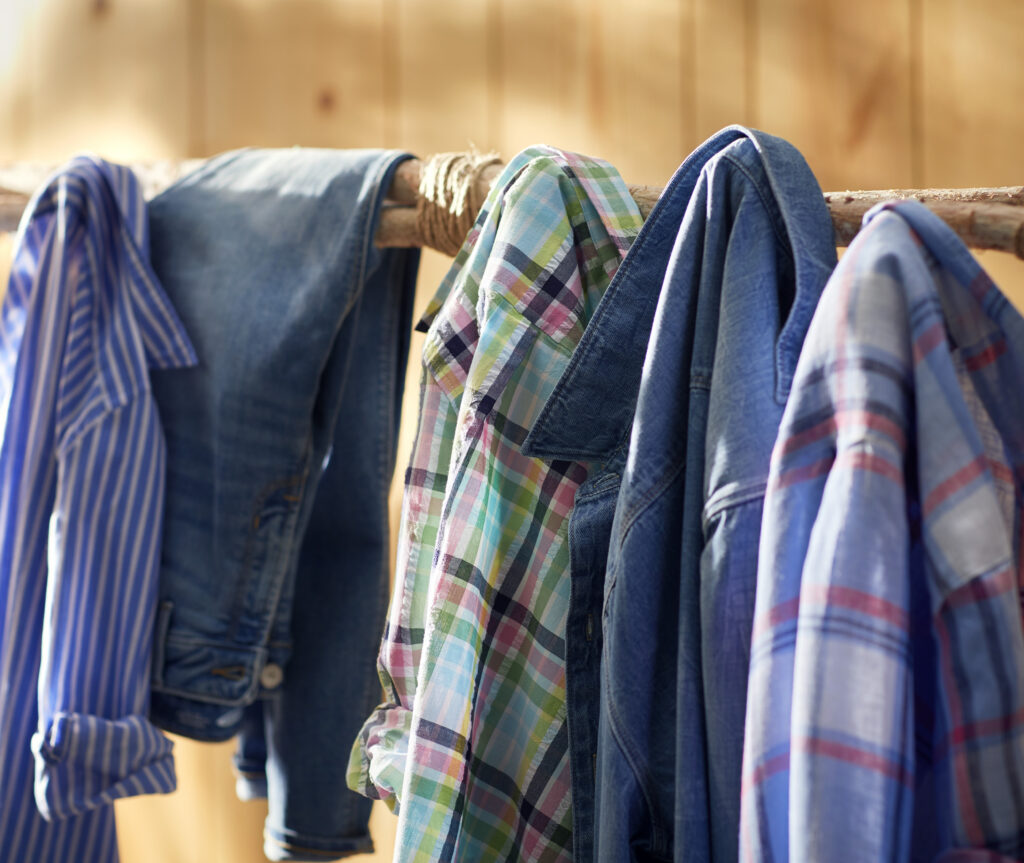 Plaid shirts hanging on a rack
