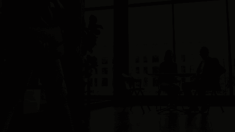 Person walking through a modern office lobby