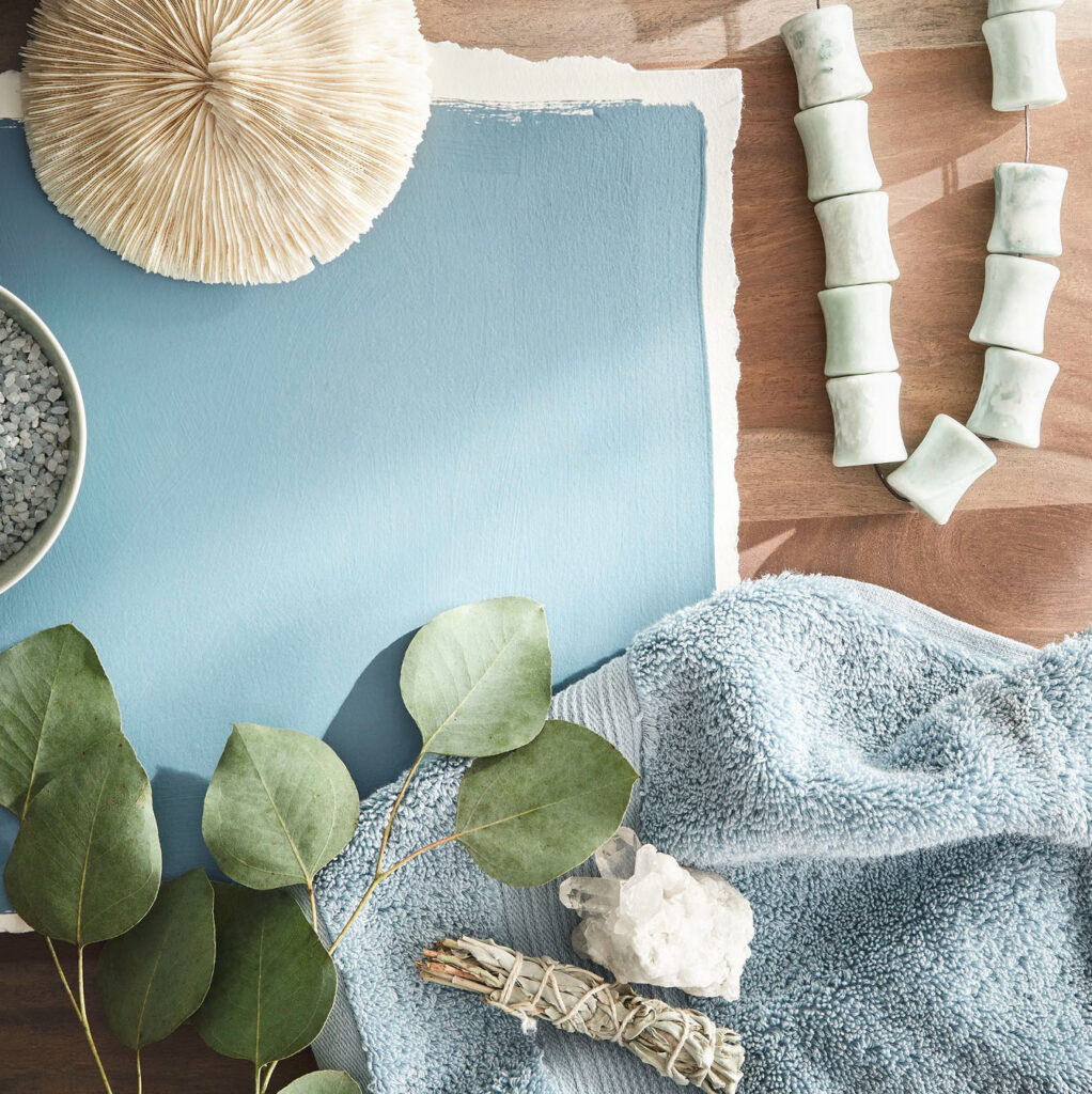 Paint color mood board with blue swatches and decor