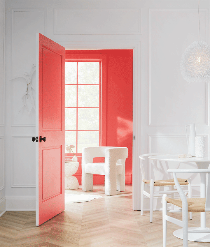 Room with a brightly painted red door